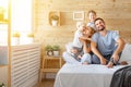 Happy family mother father and children daughter and son in bed Royalty Free Stock Photo