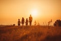 Happy family: mother, father, children son and daughter on sunset AI generated Royalty Free Stock Photo