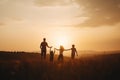 Happy family: mother, father, children son and daughter on sunset AI generated Royalty Free Stock Photo