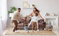 Happy family mother father and children dancing at home Royalty Free Stock Photo