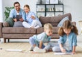 Happy family mother father and kids draw together at home Royalty Free Stock Photo