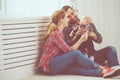 Happy family mother and father playing with a baby Royalty Free Stock Photo