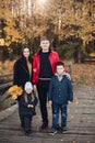 Happy family mother, father and two children posing together outdoors Royalty Free Stock Photo