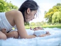 Happy family, Mother and little baby laughing and playing in the summer in the park Royalty Free Stock Photo