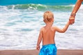 Happy family. Mother, little child on summer beach vacation Royalty Free Stock Photo