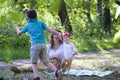 Happy family. Mother with the little daughter and the son have a Royalty Free Stock Photo