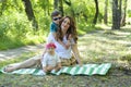 Happy family. Mother with the little daughter and the son have a Royalty Free Stock Photo