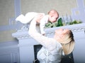 Happy family. mother plays with her young child . Royalty Free Stock Photo