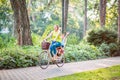 Happy family. mother and son on bicycles in park Royalty Free Stock Photo