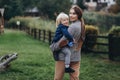 Happy family. Mother with son child playing having fun together on the grass in sunny summer day. Life moment Royalty Free Stock Photo