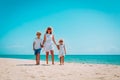 Happy family- mother with son and daughter-walk on beach Royalty Free Stock Photo