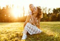 Happy family: mother and son hugging in nature in summer Royalty Free Stock Photo