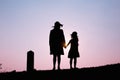 Happy family. A mother and son playing in grass fields outdoors at evening silhouette.Vintage Tone and copy space Royalty Free Stock Photo