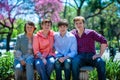 Family mother, sons and grandmother in the park