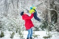 a happy family. mother and three children playing in the winter forest Royalty Free Stock Photo