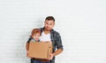 Happy family moves to new apartment. Royalty Free Stock Photo