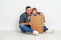 Happy family moves to new apartment. Royalty Free Stock Photo