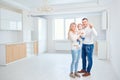 A happy family moves to a new apartment. Royalty Free Stock Photo