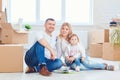 A happy family moves to a new apartment. Royalty Free Stock Photo