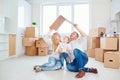 A happy family moves to a new apartment. Royalty Free Stock Photo