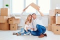 A happy family moves to a new apartment. Royalty Free Stock Photo