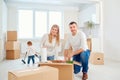 A happy family moves to a new apartment. Royalty Free Stock Photo