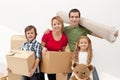 Happy family moving into a new home Royalty Free Stock Photo