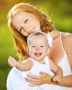 Happy family on nature mother and baby daughter Royalty Free Stock Photo