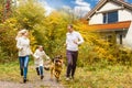 Happy family near new house. Real estate concept. Royalty Free Stock Photo