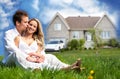 Happy family near new house. Royalty Free Stock Photo