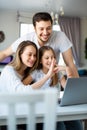 Happy family during an online meeting with relatives. Royalty Free Stock Photo