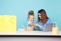 Happy family online shopping concept. Mom and child chooding things in internet isolated. Royalty Free Stock Photo