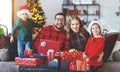 Happy family open presents on Christmas morning Royalty Free Stock Photo