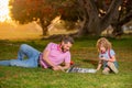 Happy family outdoor. Father and son playing chess. Royalty Free Stock Photo