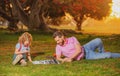 Happy family outdoor. Father and son playing chess. Royalty Free Stock Photo