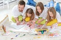 Happy family painting together Royalty Free Stock Photo