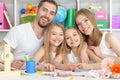 Happy family painting together Royalty Free Stock Photo