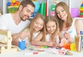 Happy family painting together Royalty Free Stock Photo