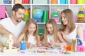 Happy family painting together Royalty Free Stock Photo