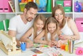 Happy family painting together Royalty Free Stock Photo