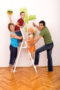 Happy family with painting utensils Royalty Free Stock Photo