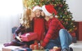 Happy family open presents on Christmas morning Royalty Free Stock Photo