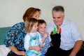 Family playing with hand puppets