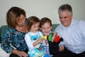 Family playing with hand puppets Royalty Free Stock Photo