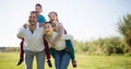 happy family of parents with two children enjoy a walk in city park Royalty Free Stock Photo