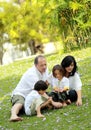 Happy family in the park Royalty Free Stock Photo