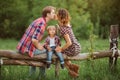 Happy family in a park Royalty Free Stock Photo