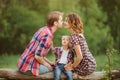 Happy family in a park Royalty Free Stock Photo