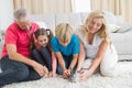 Happy family with pet bunny Royalty Free Stock Photo