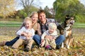 Happy Family and Pet Dog Autumn Portrait Royalty Free Stock Photo